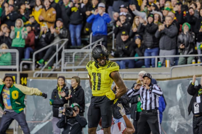Oregon Ducks defensive back Trikweze Bridges celebrates a pass breakup against USC wide receiver Brenden Rice.